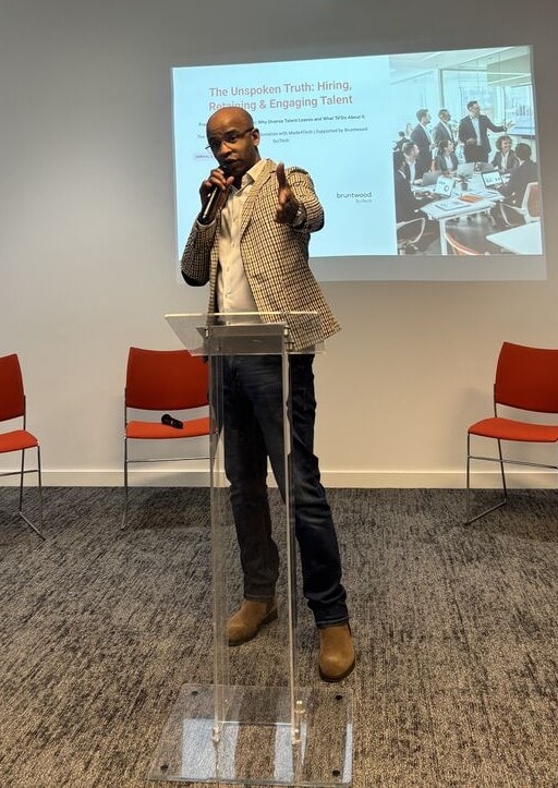 Wayne Bennett speaking at a leadership event